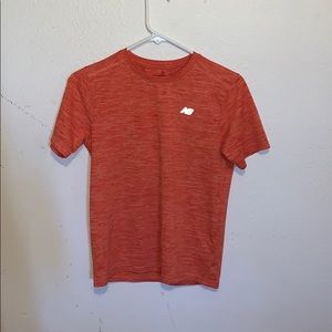 Orange new balance dri-fit shirt